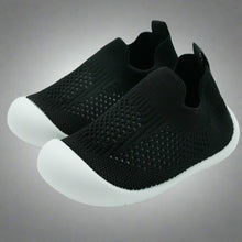 Load image into Gallery viewer, Crafted for comfort and stability, these first walker shoes are perfect for little ones taking their first steps. The soft, breathable knit upper provides a snug yet flexible fit, allowing tiny feet to move naturally and comfortably. With a lightweight, non-slip sole, these shoes offer essential grip and support as your baby learns to walk with confidence