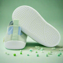 Load image into Gallery viewer, Crafted for comfort and stability, these first walker shoes are perfect for little ones taking their first steps. The soft, breathable knit upper provides a snug yet flexible fit, allowing tiny feet to move naturally and comfortably. With a lightweight, non-slip sole, these shoes offer essential grip and support as your baby learns to walk with confidence