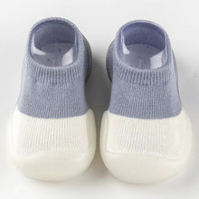 Load image into Gallery viewer, Tiny Urban Walkers Sock Shoes – Soft and breathable sock shoes designed for new walkers. Featuring a stretchy knit upper for comfort and flexibility, with a lightweight, non-slip sole for stability on any surface. These slip-on shoes are perfect for indoor and outdoor play, offering superior traction and protection with a rubber anti-collision toe cap. Available in pastel colors, they provide both style and support for your baby's first steps."