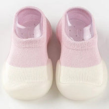 Load image into Gallery viewer, Tiny Urban Walkers Sock Shoes – Soft and breathable sock shoes designed for new walkers. Featuring a stretchy knit upper for comfort and flexibility, with a lightweight, non-slip sole for stability on any surface. These slip-on shoes are perfect for indoor and outdoor play, offering superior traction and protection with a rubber anti-collision toe cap. Available in pastel colors, they provide both style and support for your baby's first steps."