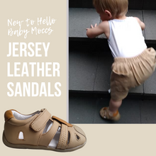 Load and play video in Gallery viewer, Jersey Leather Toddler Sandals – Comfortable and protective sandals for toddlers, featuring open sides for breathability, a closed-toe cage for anti-stub protection, and closed heels for added support. Designed in a classic style, these sandals are perfect for both boys and girls, offering durability and comfort for first walkers.