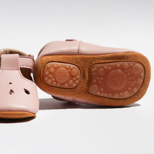 Load image into Gallery viewer, Brooklyn T-bar moccasins for baby girls, featuring soft leather with delicate teardrop cut-out details, adjustable buckle strap, and cushioned ankles for comfort. Available in soft suede soles for younger sizes (0-12 months) and flexible rubber soles for older sizes (12-24 months), these stylish and lightweight shoes are perfect for special occasions and everyday wear."