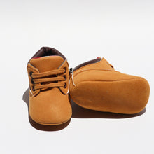Load image into Gallery viewer, Little Tradie Booties – Adorable pre-walker or first walker booties for boys and girls, designed with a faux-leather upper, plaid-patterned lining, and soft cotton-reinforced soles. Featuring long laces for a snug fit and decorative tab details, these booties offer a cute and protective option for little feet. Soft, lightweight, and water-resistant, they’re perfect for active little tradies!