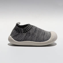 Load image into Gallery viewer, Luna Sneaker – Exclusive first walker sneakers for toddlers, made with breathable woven linen fabric and cushioned, flexible rubber soles. These sneakers feature moisture-wicking fabric to keep feet dry, a roomy toe section for wiggle room, and a stretchy pull-on design with no laces. Ideal for first walkers, they provide comfort, support, and stability with non-slip soles and cushioned insoles.