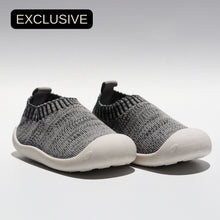 Load image into Gallery viewer, Luna Sneaker – Exclusive first walker sneakers for toddlers, made with breathable woven linen fabric and cushioned, flexible rubber soles. These sneakers feature moisture-wicking fabric to keep feet dry, a roomy toe section for wiggle room, and a stretchy pull-on design with no laces. Ideal for first walkers, they provide comfort, support, and stability with non-slip soles and cushioned insoles.