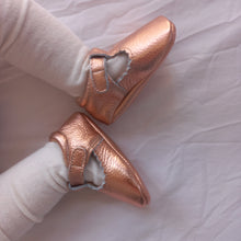Load image into Gallery viewer, Manhattan T-Bar Moccasins – Modern leather moccasins with classic adjustable t-bar straps and side buckles. Featuring soft, flexible soles for comfort and freedom of movement, these moccasins have a scalloped edging detail, cushioned ankles, and cotton insoles. Ideal for little feet, they provide a barefoot feel with stylish and functional design.