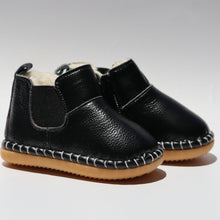 Load image into Gallery viewer, First Walker Boots – Comfortable and protective boots for toddlers, made with water-resistant leather and flexible, non-slip rubber soles. Featuring a cotton-fleece lined interior for added comfort, rounded toes for wiggle room, and elastic gussets with side zippers for easy on/off. These versatile unisex boots are perfect for outdoor adventures while providing freedom of movement for little explorers.