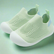 Load image into Gallery viewer, Crafted for comfort and stability, these first walker shoes are perfect for little ones taking their first steps. The soft, breathable knit upper provides a snug yet flexible fit, allowing tiny feet to move naturally and comfortably. With a lightweight, non-slip sole, these shoes offer essential grip and support as your baby learns to walk with confidence
