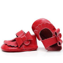 Load image into Gallery viewer, Florence Street Moccs – Soft leather moccasins for baby girls featuring a striking side bow and textured leather. Ideal for babies and pre-walkers, these moccs offer comfort, style, and gentle support for growing feet.
